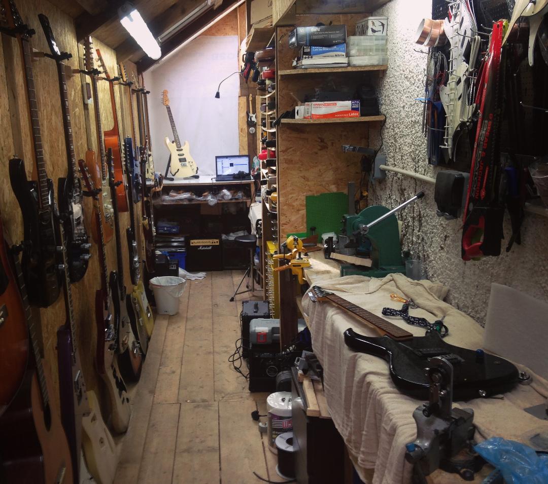 Our workshop full of tools and guitars
